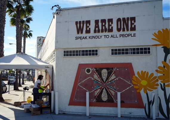 Photo of artwork being completed at 11029 Washington Blvd.