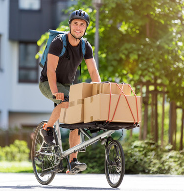 Man carrying boxes on cargo bike