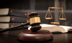 Gavel and scale in court - legal concept