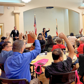 Assemblymember Patrick Ahrens and Mayor Liang Chao wave to attendees at Community Coffee event at Quinlan Community Center