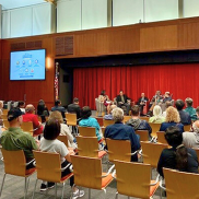 Attendees listen to Cybersecurity Public Awareness panelists