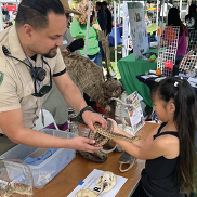 Park ranger at Earth and Arbor Day booth