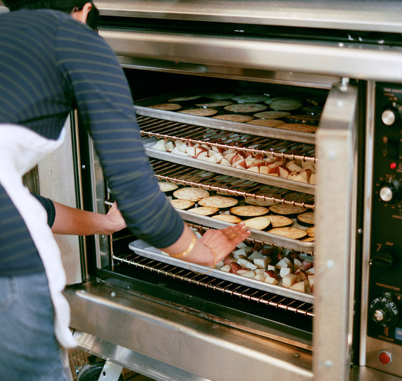 sheet pans of food in oven