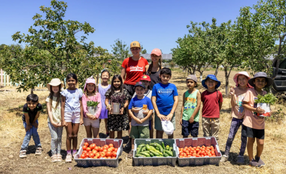 Students and educators on farm