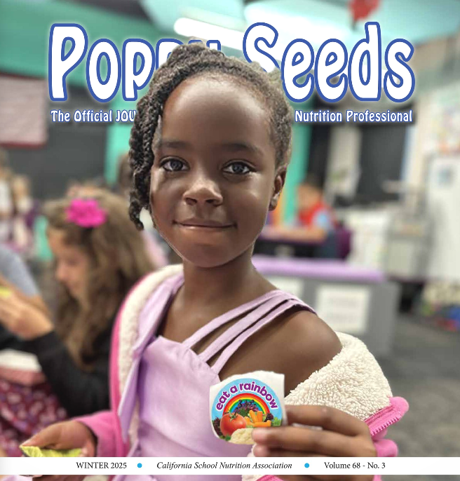 Poppy Magazine cover with student holding an eat the rainbow sticker