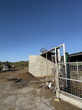 Manure collection pit and screw press separator installed as part of the AMMP project.