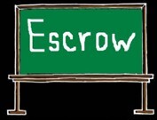 chalkboard with escrow written on it