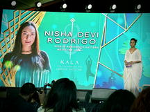 Commissioner Rodrigo on a stage