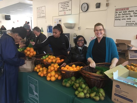 Vicki and friends hand out much needed food at Laney College