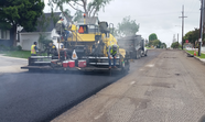 Construction Workers Repaving a street