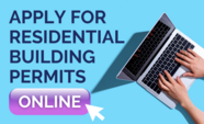 Aerial view of Hands using a laptop next to words "Apply for Residential Building Permits Online"