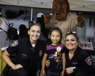 ESPD Officers with child and McGruff at National Night Out