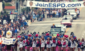El Segundo High School Homecoming Parade with cheerleaders, band, and cars