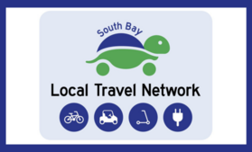Cartoon turtle logo with words "Local Travel Network"