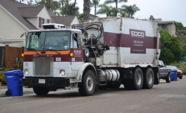 EDCO truck on a residential street