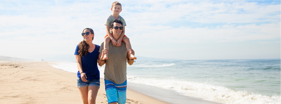 Family walking on El Segundo Beach