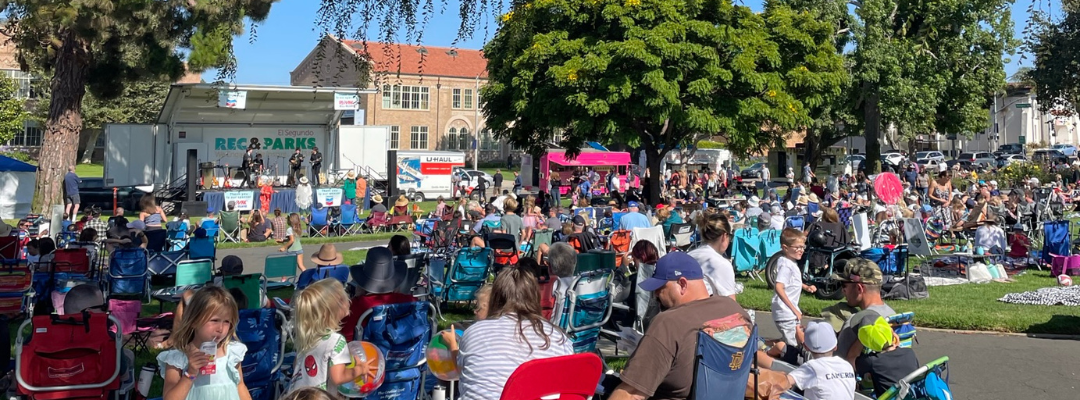 Crowd of people watching a summer concert in El Segundo LIbrary Park