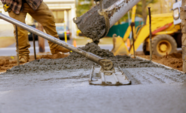 Close up on concrete being poured in a residential area