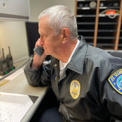 Police volunteer making a phone call 