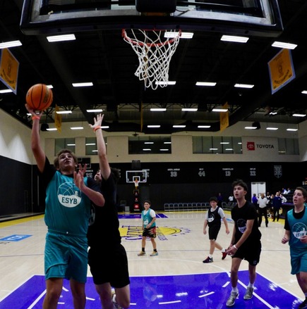 ESYB championship game player making a layup