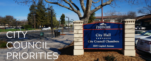 City Hall sign, street, and sidewalk