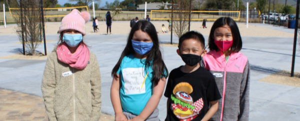 kids in masks at park