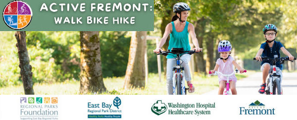 family on bikes with helmets