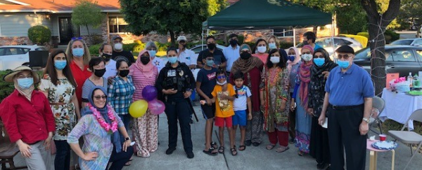 people outdoors at block party