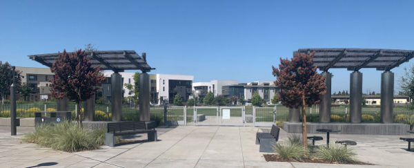 park with benches and shade structures