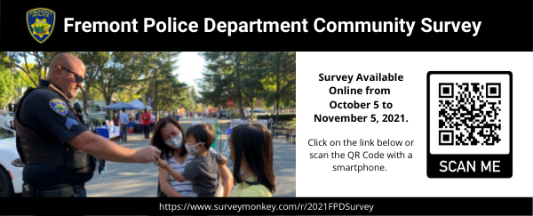 police officer shaking hands with boy and his family with QR code