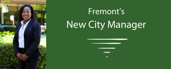 new city manager standing outside