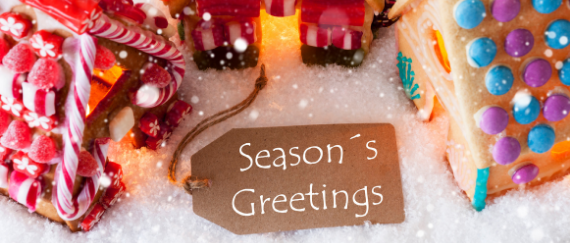 gingerbread houses and wooden placard