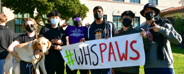 students holding banner