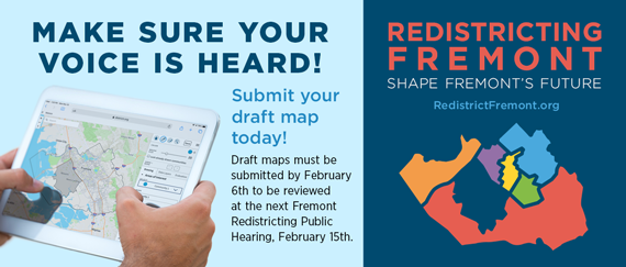 hands holding tablet and Fremont districts map