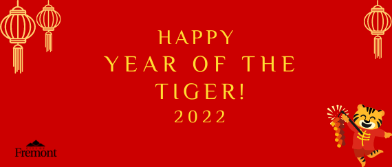 lanterns and tiger dancing with text: Happy Year of the Tiger 2022