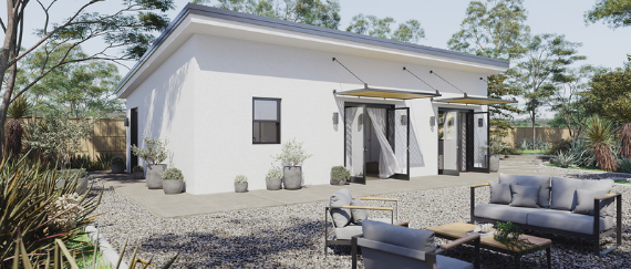 cottage, trees, and outdoor couches and coffee table 