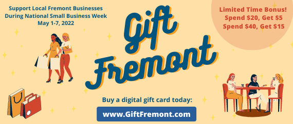 people holding shopping bags and sitting at the table