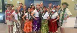 older adults performing hula at age well center