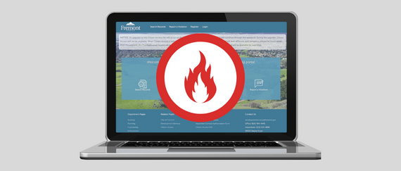 laptop with aerial of Fremont and fire icon
