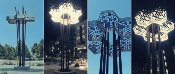 public art sculpture with metal components shaped like hive of life