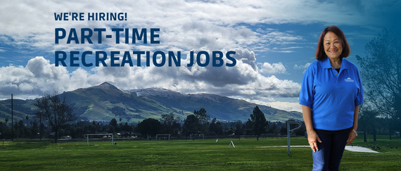 woman standing on grass with Mission Peak, hills, and trees in background. In text: We're hiring! Part-Time Recreation Jobs