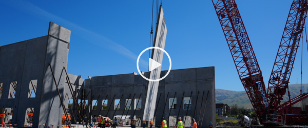 Concrete tilt up banner with play button