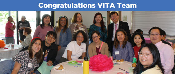 VITA volunteers and staff celebrating with City Council members 21 year of providing this important service