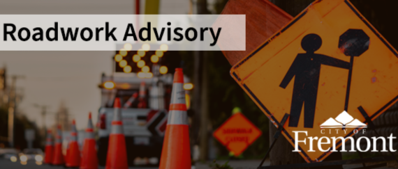 traffic cones on roadway, message reader board, with orange sign and construction crew working. In text: Roadwork Advisory