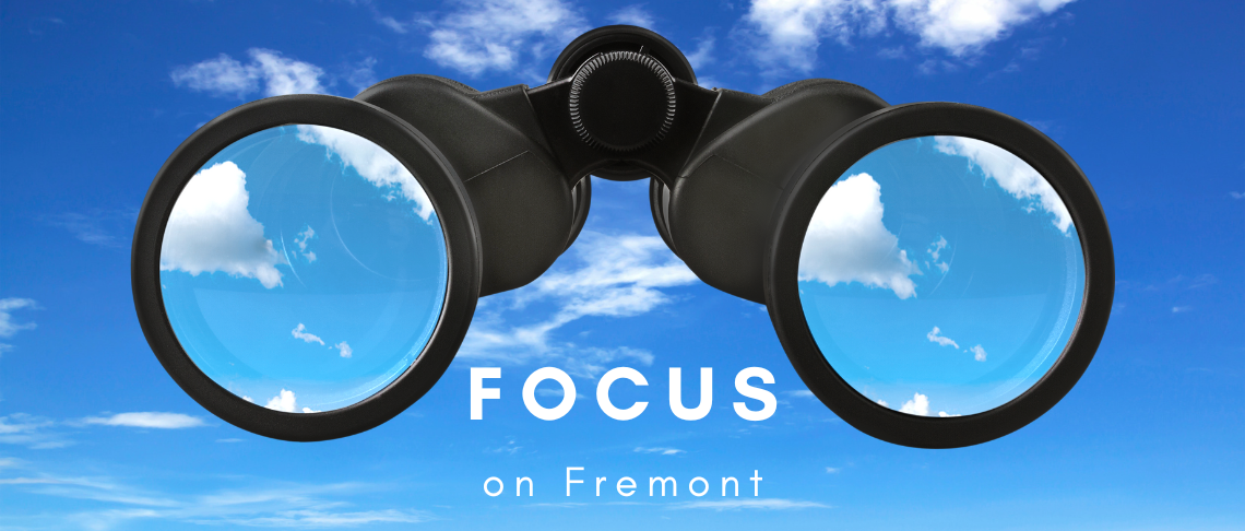 binoculars and sky. In text: Focus on Fremont