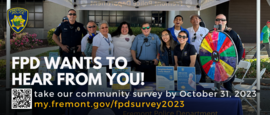 Fremont Police Department officers, personnel, and volunteers at community booth. In text: FPD Wants to Hear from You! Take our survey.