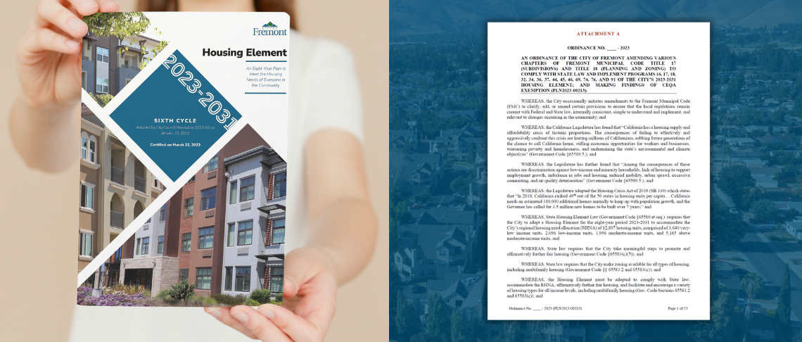 person holding the cover of the Housing Element with the first page of the ordinance