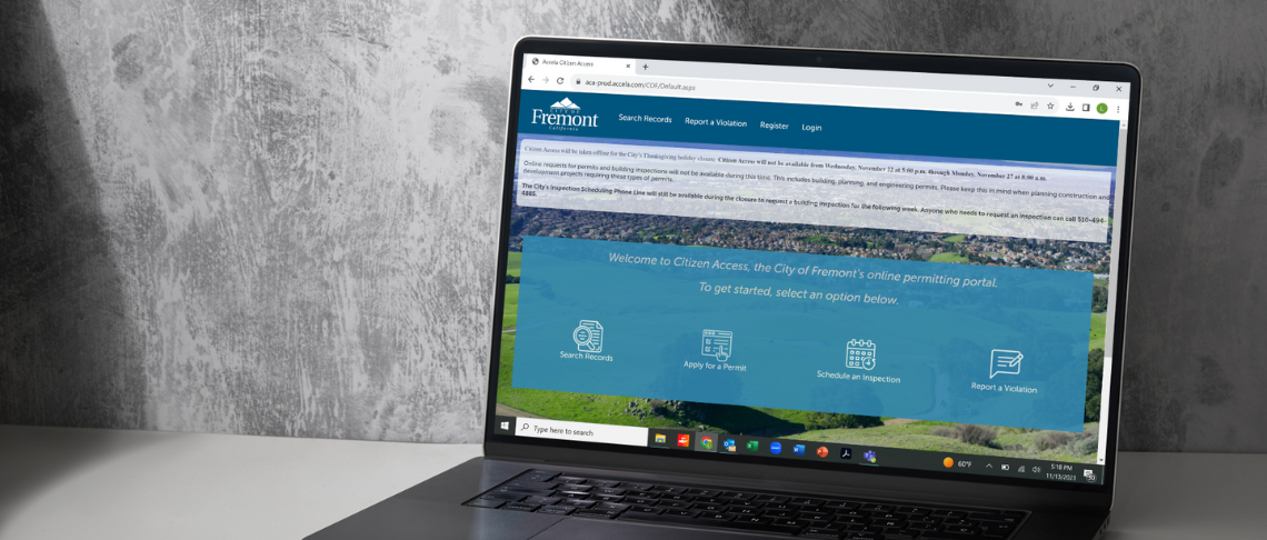 laptop with Citizen Access webpage loaded on monitor