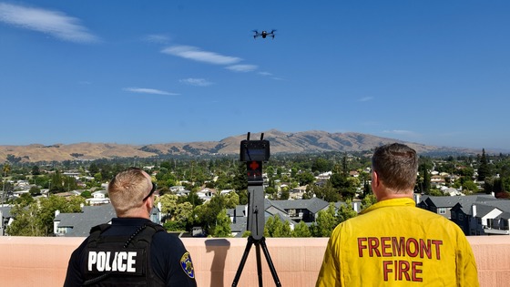 Fremont Police and Fremont Fire officials standing next to each other utilizing a Unmanned Aerial Vehicles (UAVs) 