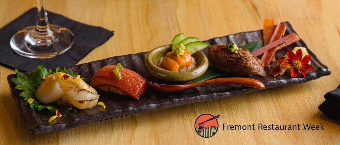 sushi rolls on plate with Fremont Restaurant Week logo with noodles